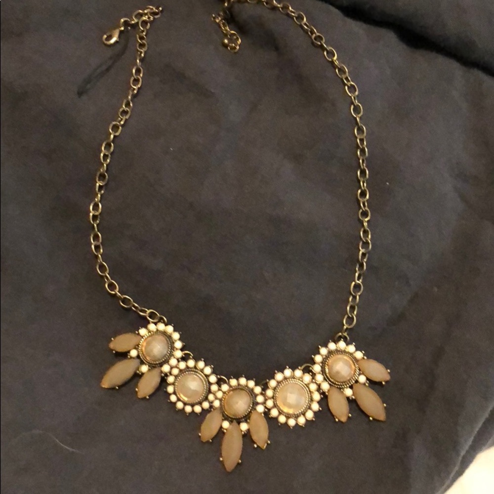 Pink and gold necklace.
